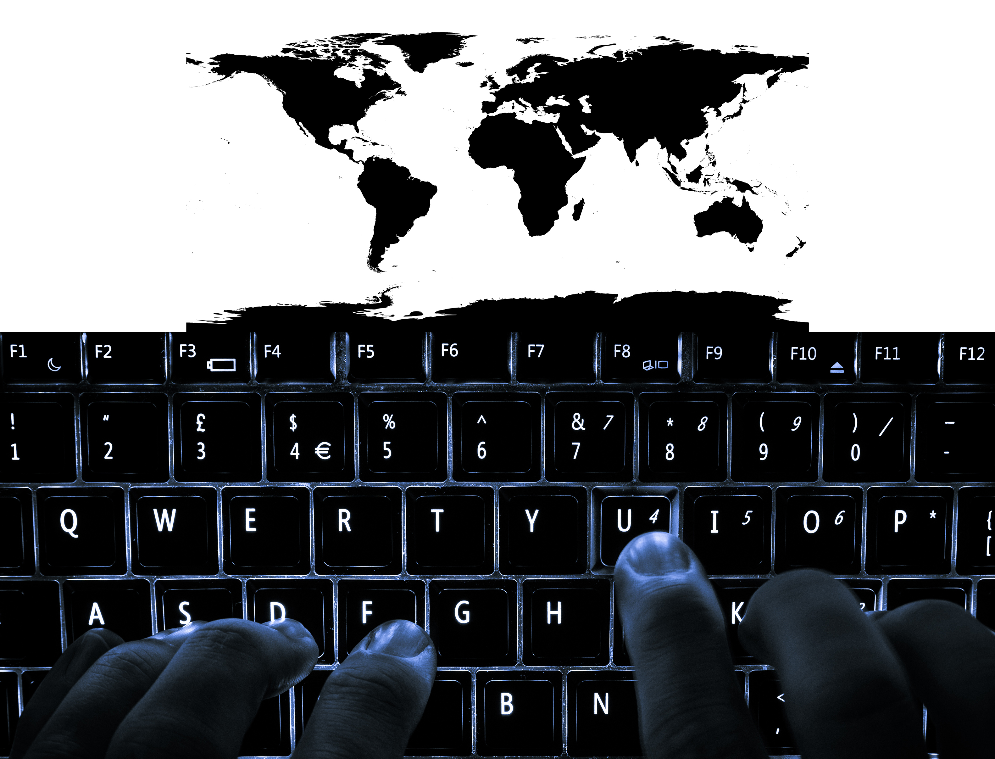 image of world map and backlit keyboard with hands typing