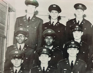 1959 Cactus yearbook photo of Colonel (Ret) Leon Holland and eight other ROTC cadets